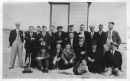 Samuel Vaux in Belgium on what may have been a WW1 reunion.  Neckties are all the same.  Sam is front row third from right in the light coloured flat cap.
